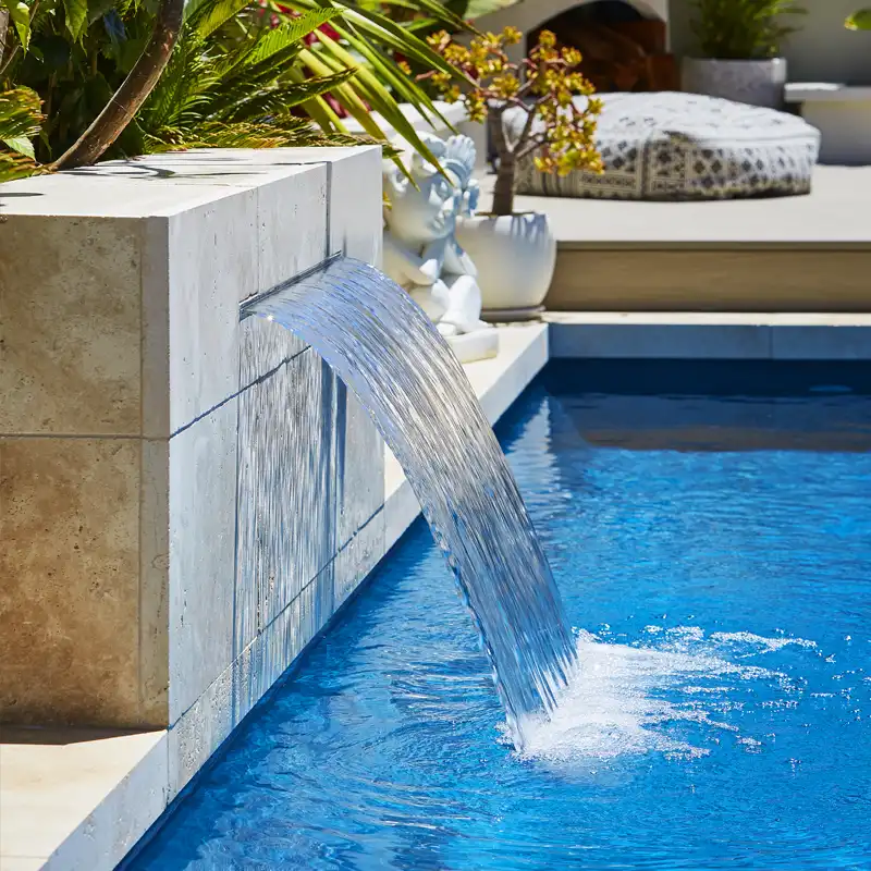 Fibreglass Pools Sunshine Coast | Monsoon Pools Contemporary fibreglass pool with modern water feature on the Sunshine Coast