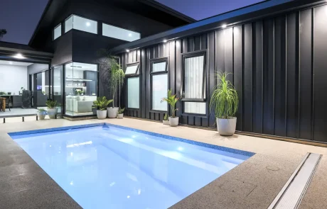 Heron Series compact fibreglass pool in a contemporary Queensland backyard