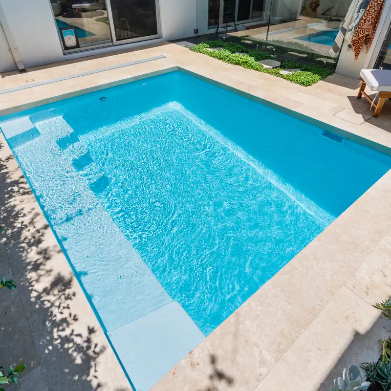 Caloundra Pool Builder | Fibreglass Swimming Pool | Monsoon Pools Modern fibreglass swimming pool built by a Caloundra pool builder for a contemporary Sunshine Coast home