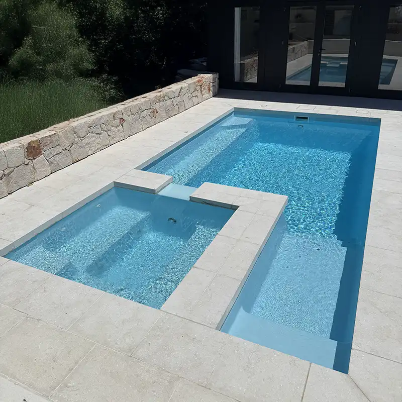 Coral Bay fibreglass pool and spa combination with integrated spillway and entry steps