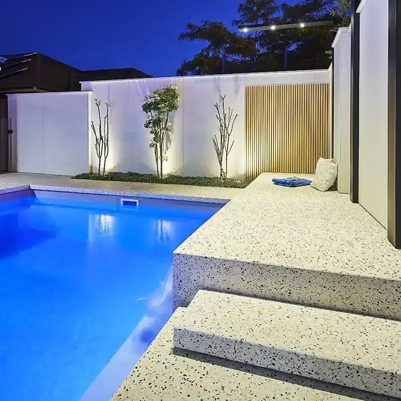 Cottesloe Series fibreglass pool with modern design, entry steps and spacious outdoor entertaining area.