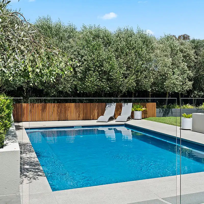 Hampton Grande wide family fibreglass pool in a modern landscaped backyard