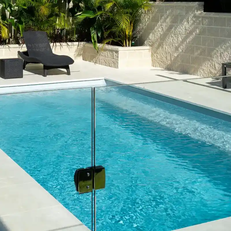 Hampton fibreglass pool with integrated spa, water feature and contemporary outdoor entertaining area.