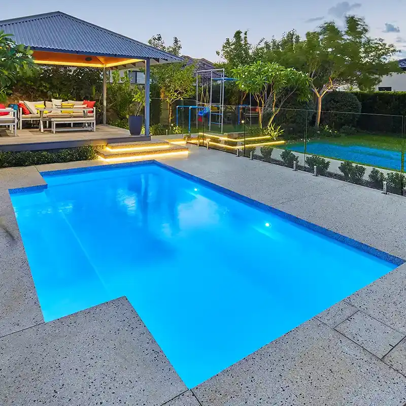 Medina fibreglass pool installed in a modern backyard with clean lines and space-efficient design.