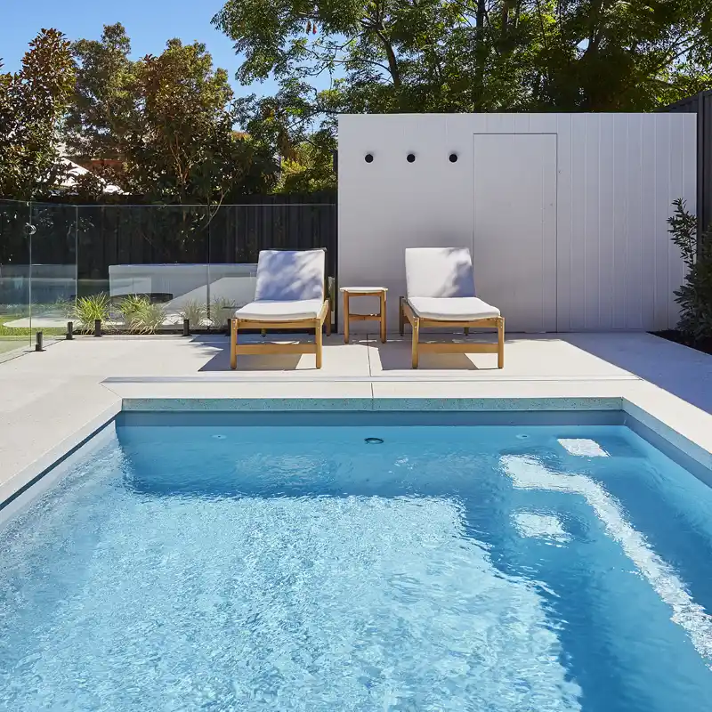 Modern fibreglass swimming pool designed by a Noosa pool builder for a contemporary Sunshine Coast home