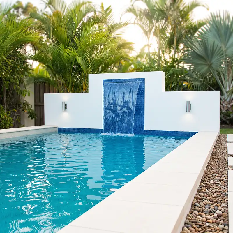 Custom concrete swimming pool with tiled water feature on the Sunshine Coast