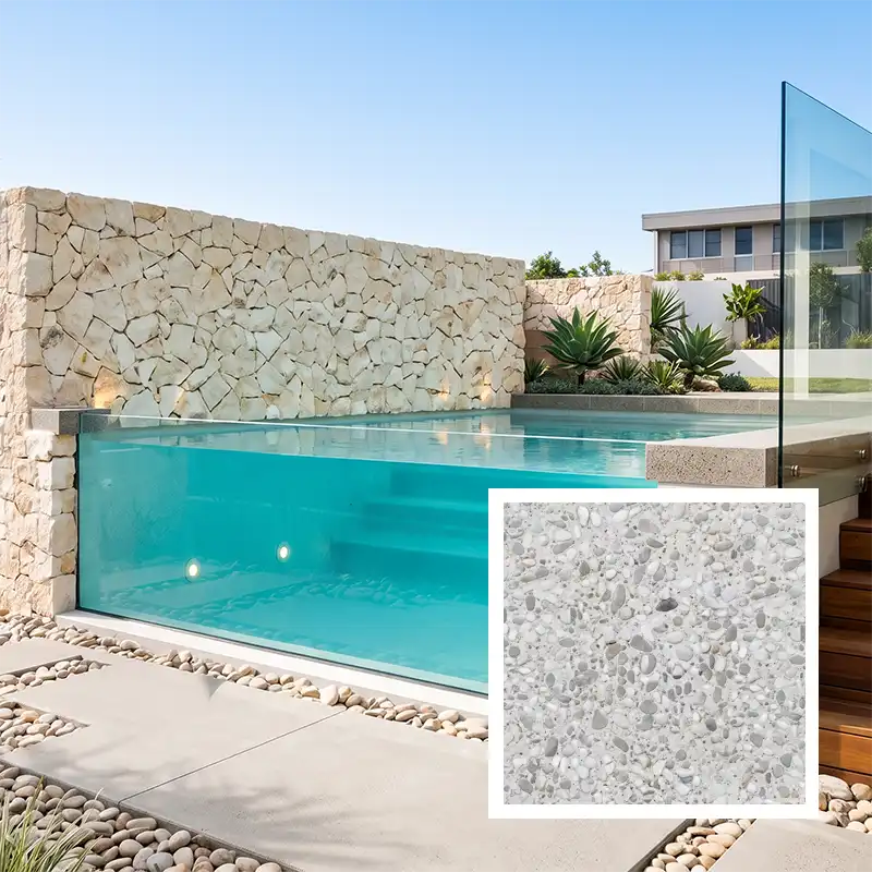 White exposed aggregate concrete pool finish with glass pool window and modern pool design on the Sunshine Coast