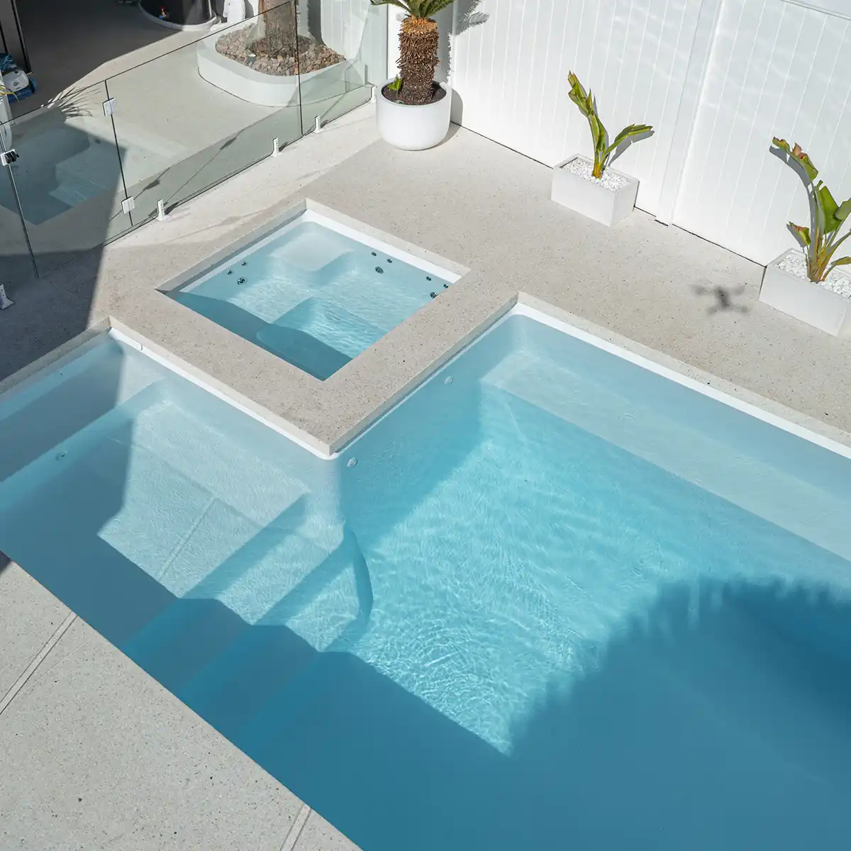 Overhead view of the Whitehaven fibreglass pool and spa combination with integrated spa